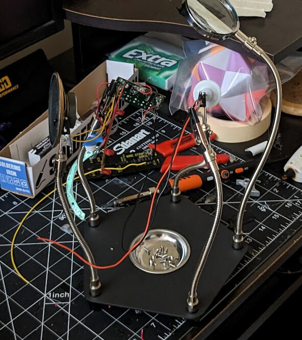 I had originally planned to use a cheap kid's toy to make lights in the jaw light up whenever I talked, but ended up having to scrap it as it was too difficult to get to work.